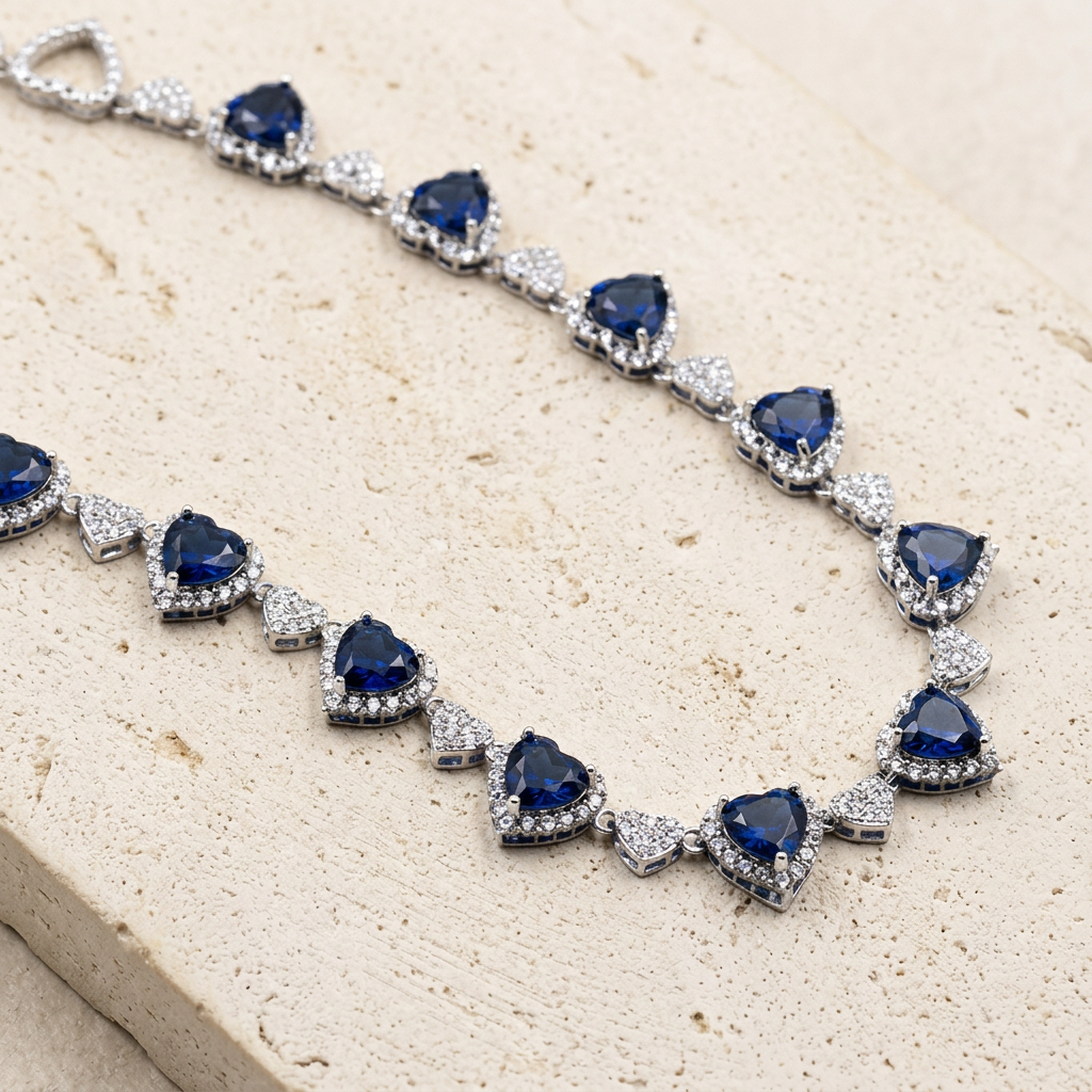 Profile view of the RW sapphire heart necklace in 14k White Gold