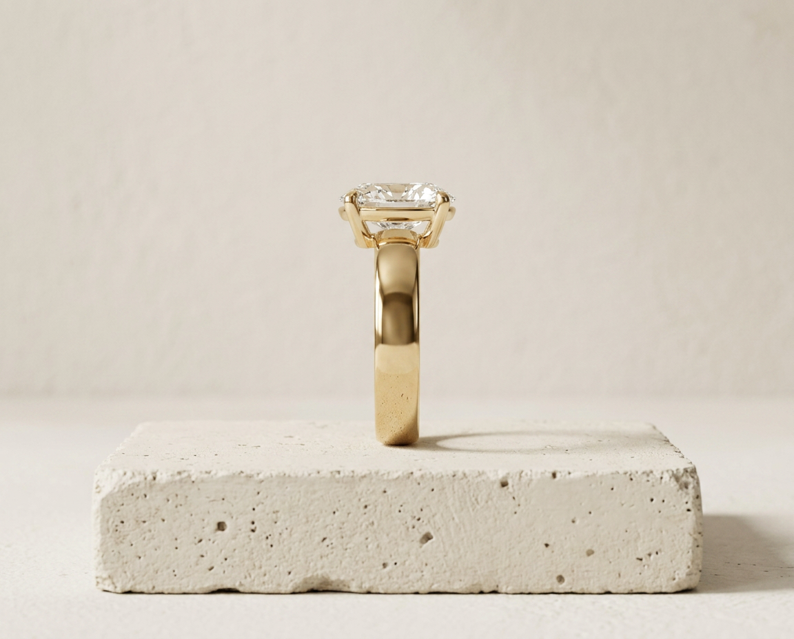 Profile view of The Muse oval solitaire