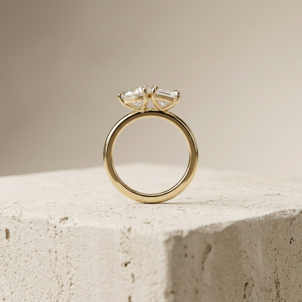 Profile view of The Plot Twist toi et moi ring